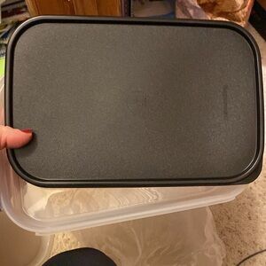 New, Tupperware storage container. Black lid, holds 8 1/2 cups.